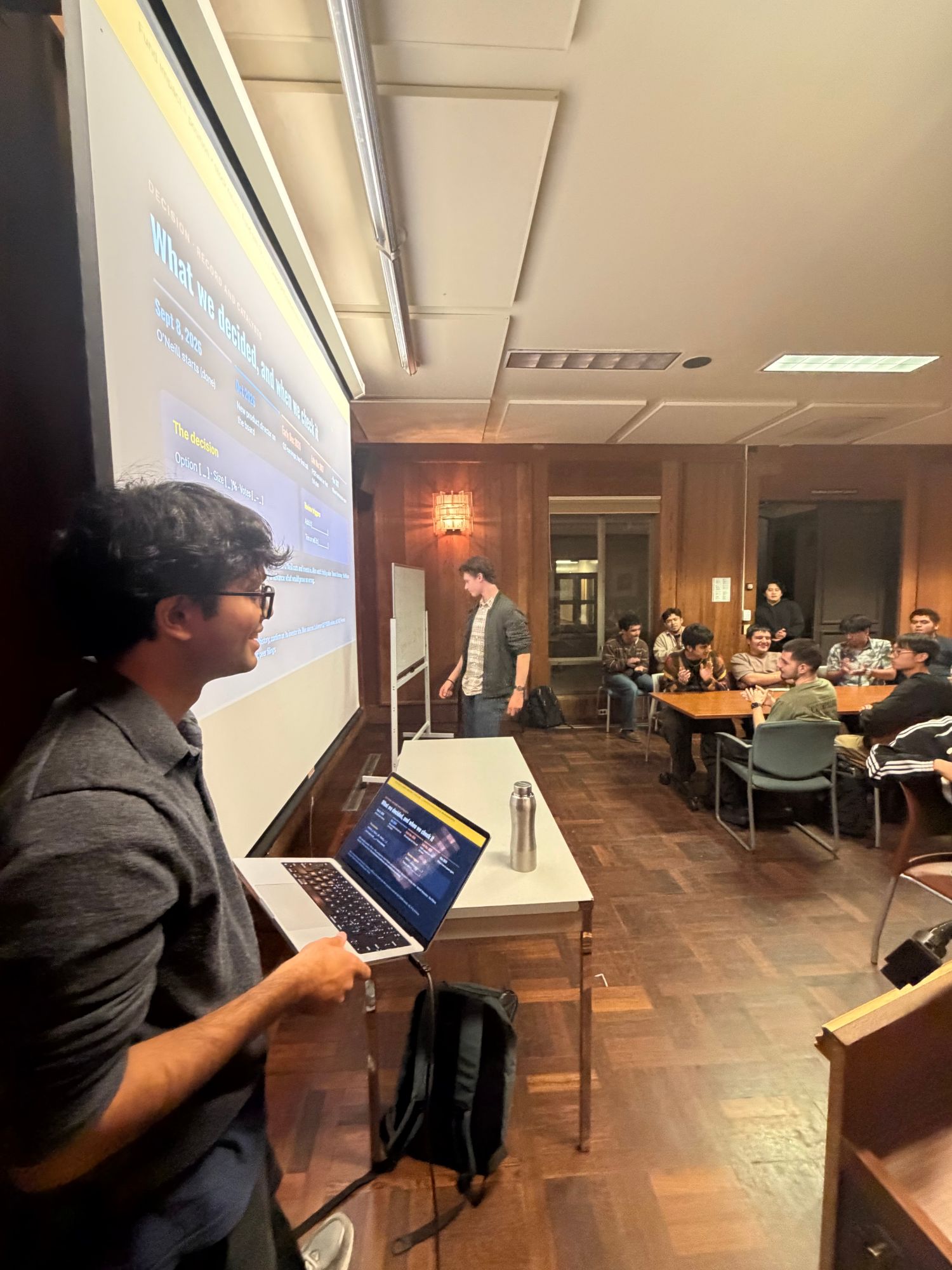 Me at the projector, presenting to the Slug Fund